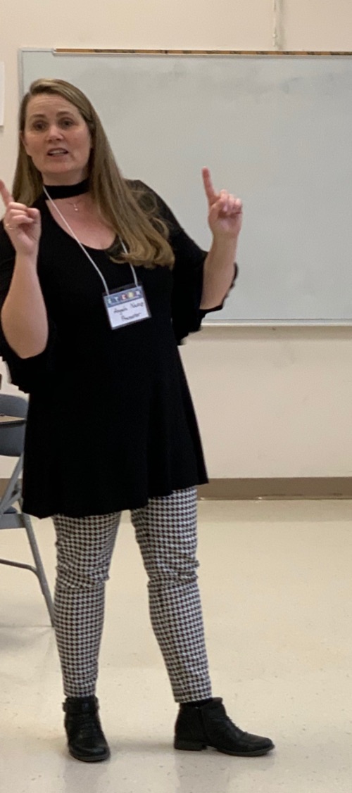 Angela Naeve, vocal teacher who also has a traveling music ministry, led singing with songs to take back to the classroom in her breakout sessions.